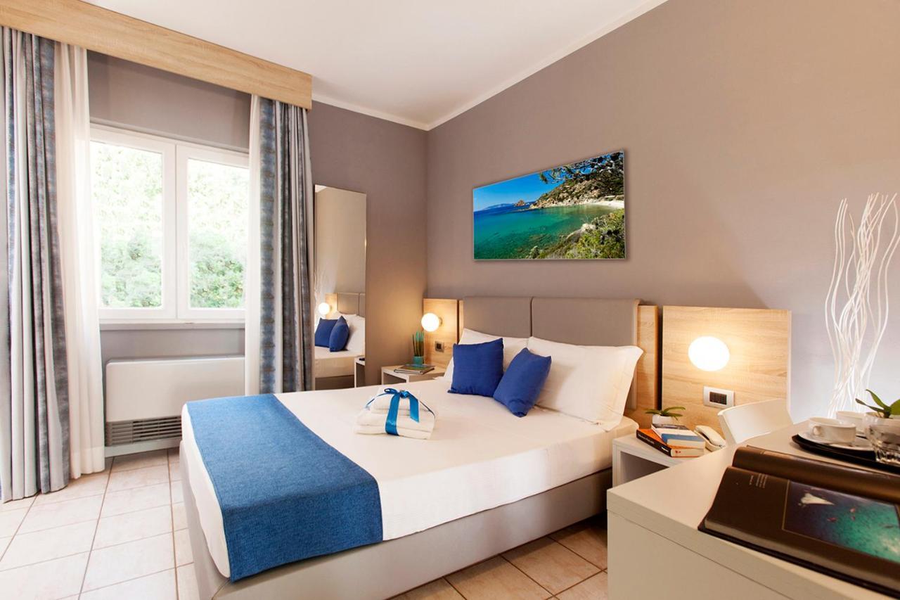 Bike&Boat Argentario Hotel Порто Санто Стефано Екстериор снимка